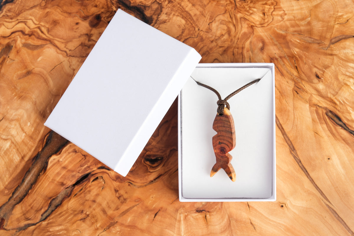 Plum wood fish pendant