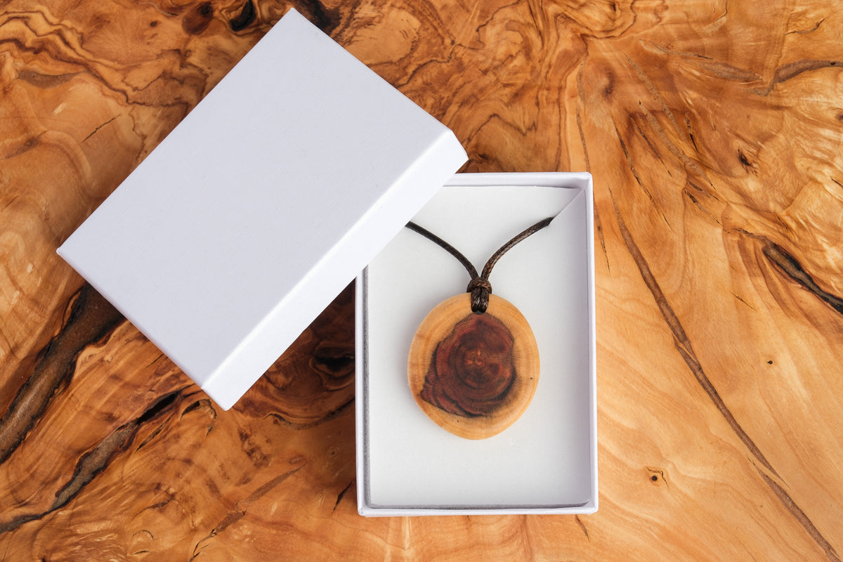 Plum wood circle pendant